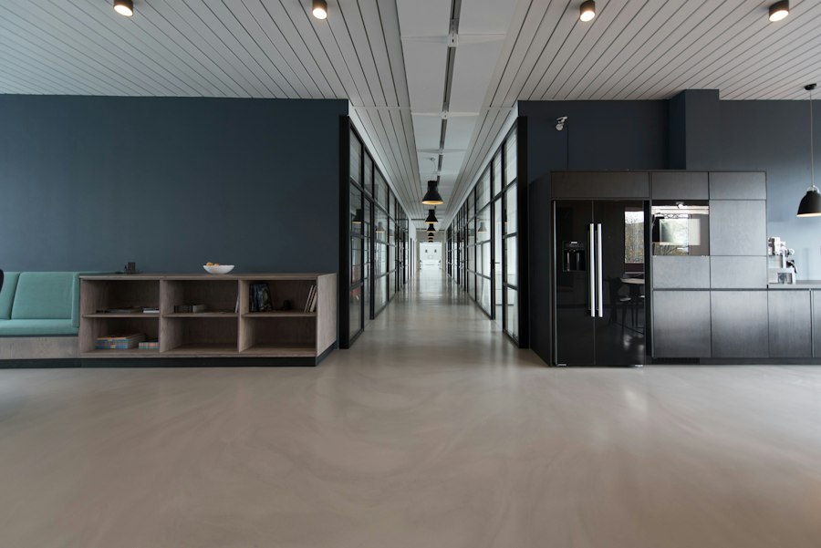 A glazed office interior with pendant lighting