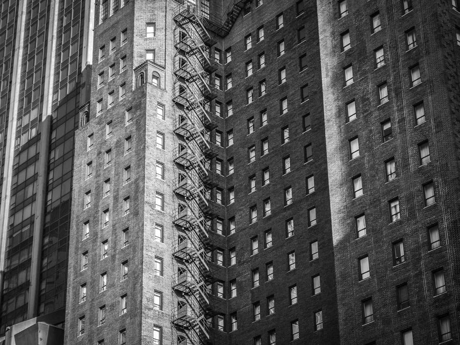 High-rise housing blocks photographed in black and white from below