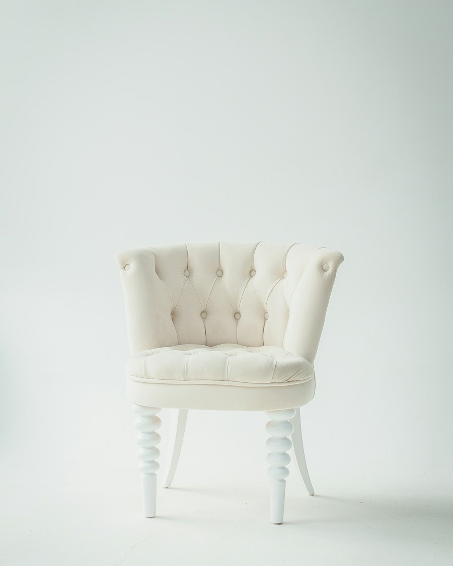 Marlow armchair in oat bouclé against a pale wall
